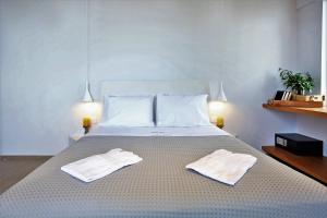 Posteľ alebo postele v izbe v ubytovaní Basilico Suites Adults Only by Estia