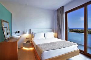 Posteľ alebo postele v izbe v ubytovaní Basilico Suites Adults Only by Estia