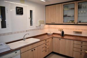 a kitchen with a sink and a counter top at VILLA GARDEN in Tarragona