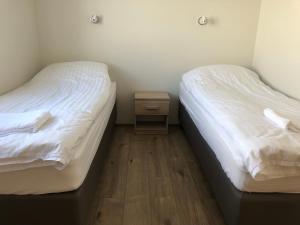 Postel nebo postele na pokoji v ubytování Mosas cottages