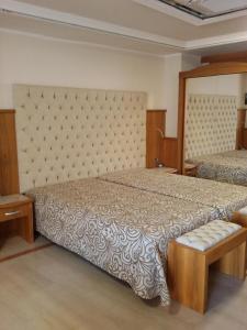 Postel nebo postele na pokoji v ubytování Hotel Panoramic