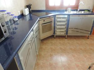 A kitchen or kitchenette at CASA del CHARCO 2,0