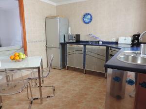A kitchen or kitchenette at CASA del CHARCO 2,0