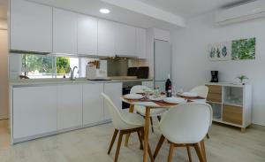 Kuchyň nebo kuchyňský kout v ubytování Apartamentos Moraira + 13 fotografií