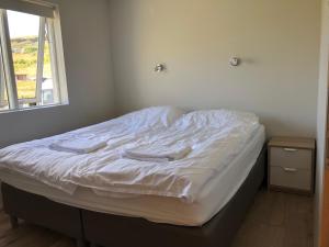 Mosas cottages客房内的一张或多张床位