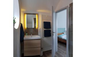Giường trong phòng chung tại Finger's Hyggelig-Haus