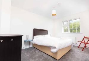 Katil atau katil-katil dalam bilik di An Searrach Dingle by Trident Holiday Homes