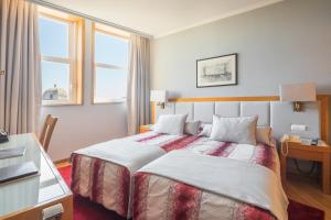 Кровать или кровати в номере Hotel Boa - Vista
