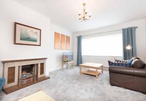 Posezení v ubytování An Searrach Dingle by Trident Holiday Homes