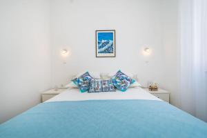 Una cama o camas en una habitación de Apartment Zaramaktum