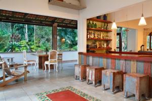 Um restaurante ou outro lugar para comer em Eco Resort Hotel Villa São Romão