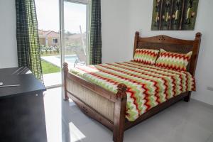 Ένα ή περισσότερα κρεβάτια σε δωμάτιο στο SOV 3 bedroom modern House