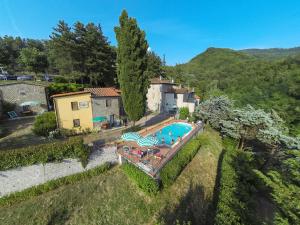 an aerial view of a house with a swimming pool at Agriturismo Corboli in Vernio