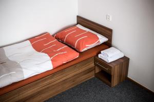 Säng eller sängar i ett rum på Ubytování Na Jarošce