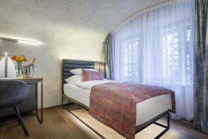 Letto o letti in una camera di Hotel Waldstein