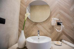 Koupelna v ubytování Hotel Europa + 31 fotografií
