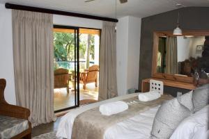 Green Pascua Bed and Breakfast客房内的一张或多张床位