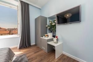 TV a/nebo společenská místnost v ubytování B&A Rooms Zadar