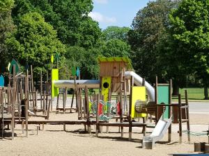 a bunch of playground equipment in a park at Ferienwohnung in Ostseenähe in Grevesmühlen