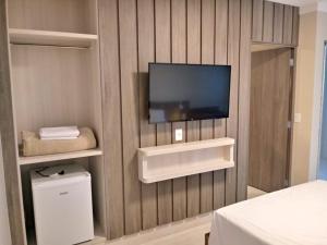 TV a/nebo společenská místnost v ubytování PIAZZA DIROMA FLATS PARA TEMPORADA