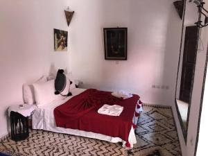 Postel nebo postele na pokoji v ubytování Riad Naya