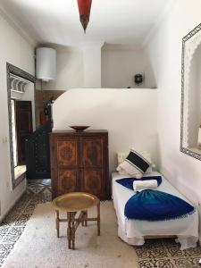 Postel nebo postele na pokoji v ubytování Riad Naya