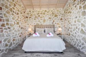 Кровать или кровати в номере Villa Semeli