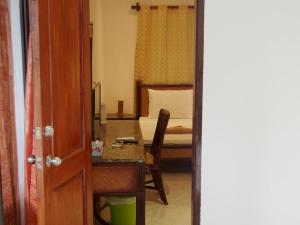 Postel nebo postele na pokoji v ubytování Alona Vida Beach Resort