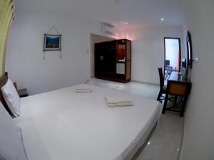 Postel nebo postele na pokoji v ubytování Alona Vida Beach Resort