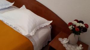 Postel nebo postele na pokoji v ubytování Apartman Štulić
