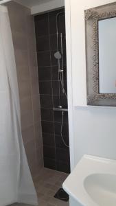 Koupelna v ubytování Punavilla Cottage + 31 fotografií