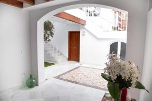 an open hallway with a fireplace in a house at 7Escalones in Rota