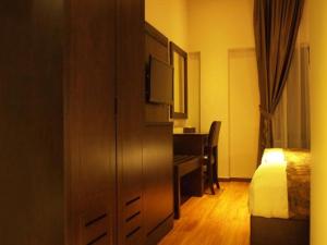 Postel nebo postele na pokoji v ubytování Castello Hotel
