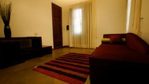 Tempat tidur dalam kamar di Hotel Cerros