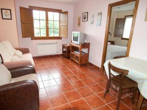 Telewizja i/lub zestaw kina domowego w obiekcie Apartamentos Rurales Casa Tata