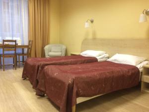 Кровать или кровати в номере Отель Большой 45