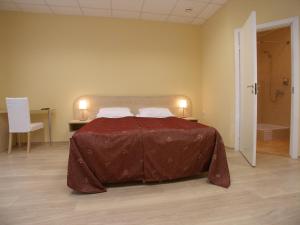  Кровать или кровати в номере Отель Большой 45 