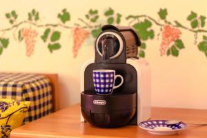Coffee and tea making facilities at Casa Vacanze Isophylla