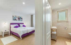 Posteľ alebo postele v izbe v ubytovaní Apartment Kata with Private Pool + 22 fotografií