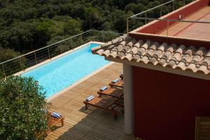 a view of a swimming pool from a building at Es Cel de Begur Hotel in Begur