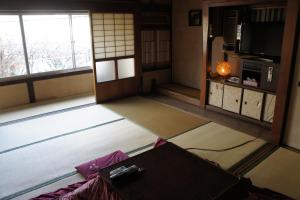 Kuchyň nebo kuchyňský kout v ubytování Miyoshiya Ryokan