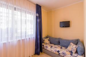 A television and/or entertainment centre at Casa Vacanze Isophylla