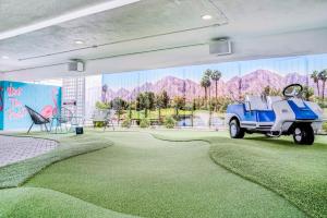a golf course with a car on the grass at Downtowner Boutique Hotel in Las Vegas