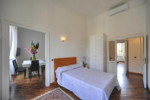 Łóżko lub łóżka w pokoju w obiekcie Rome Luxury House - The House