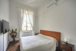 Łóżko lub łóżka w pokoju w obiekcie Rome Luxury House - The House