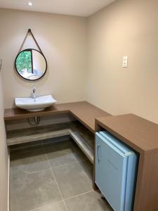 a bathroom with a sink and a mirror at Canto das Acácias in Fernando de Noronha +42 photos