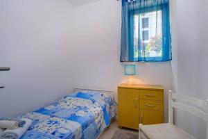 Postel nebo postele na pokoji v ubytování Maestral