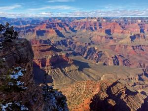 a view of the grand canyon from the edge of a cliff at Grand Canyon Plaza Hotel in Tusayan
