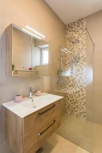 Koupelna v ubytování Apartments Luksic + 37 fotografií