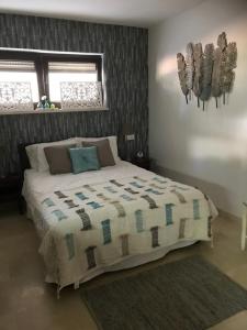A bed or beds in a room at Casa Holandaluzas Marbella near Beach, with salt water Pool and private parking
